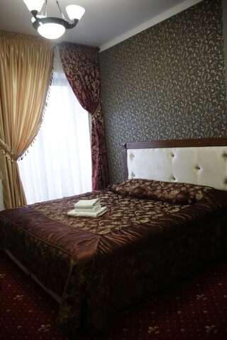 Отели типа «постель и завтрак» Garden Hall Тернополь Стандартный двухместный номер с 1 кроватью или 2 отдельными кроватями-18